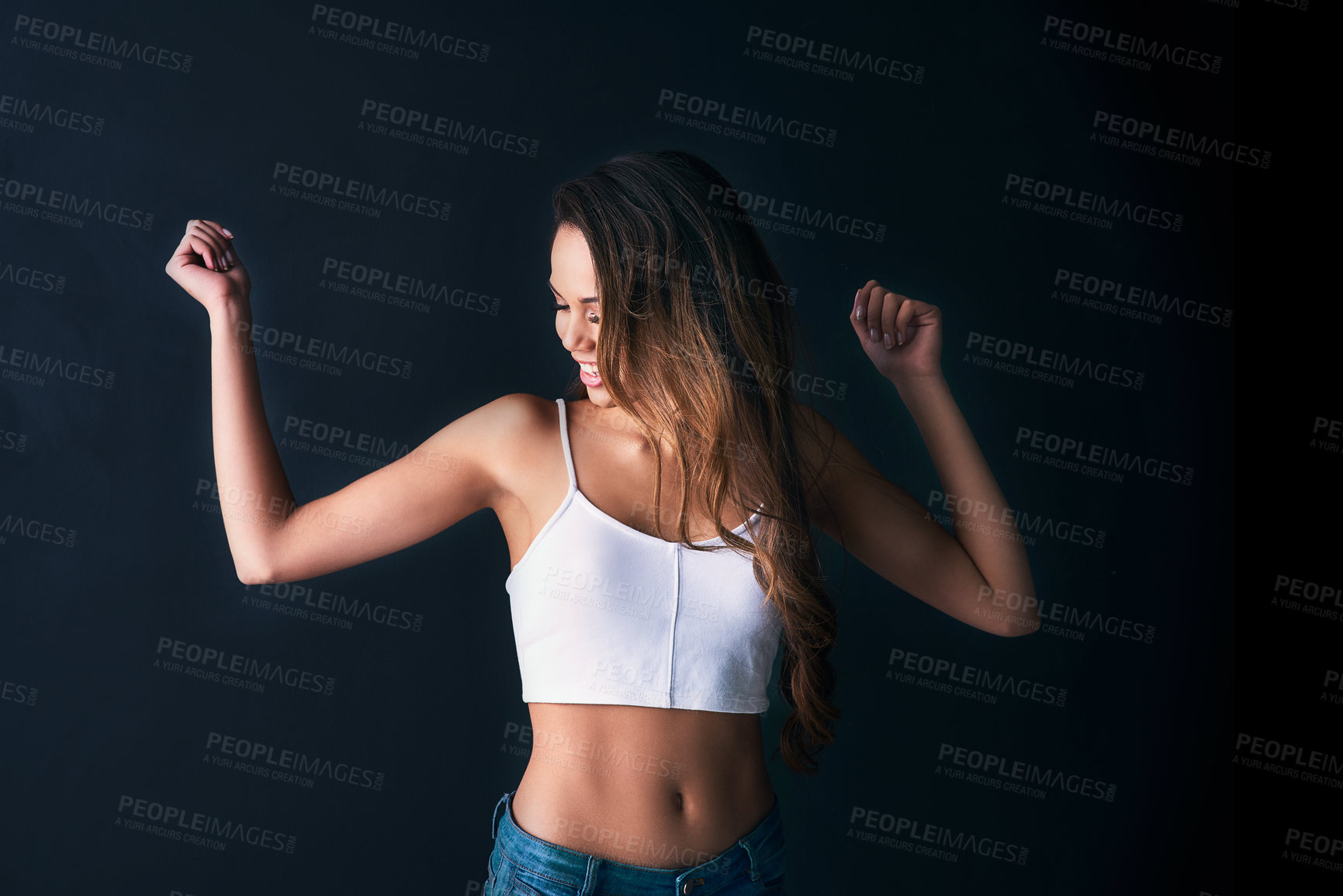 Buy stock photo Dancing, woman and fashion with confidence, hair care or pride on black background. Female person, style and trendy in having fun as satisfied or casual in outfit, clothes and positivity as student