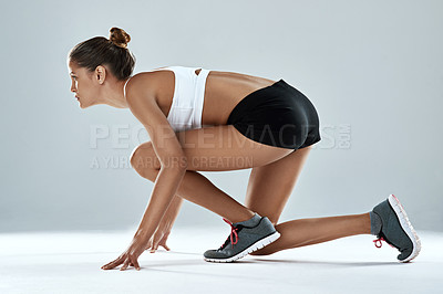 Buy stock photo Athlete, woman and ready to race in studio as runner for fitness, training and exercise for sports. Healthy, female person and active with sportswear sprint for cardio, strong and natural muscles 