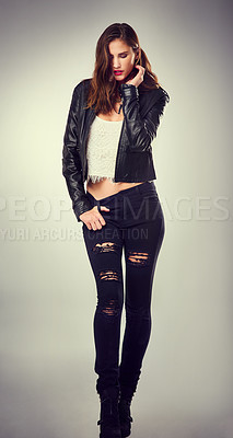 Buy stock photo Woman, thinking and party outfit with fashion, rock style and clothes in studio with punk jeans. Grunge, leather and modern style with cool, trendy and edgy rocker clothing in white background