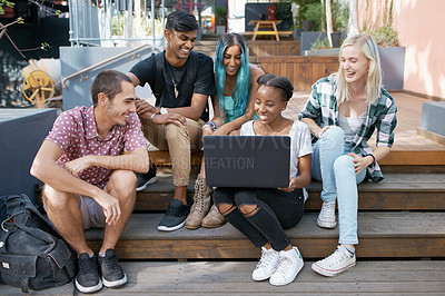 Buy stock photo Happy, students and outdoors with laptop on stairs for learning, education and online research for project. Diversity, friends and group with technology for discussion, teamwork and study session