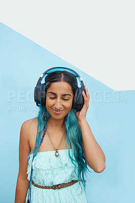 Buy stock photo Woman, happy and headphones on for music, podcast or streaming before college, university or tertiary education. Person, smiling and earphones in for listening to audio or streaming online radio