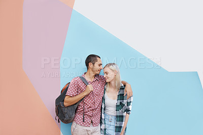 Buy stock photo Couple, students and happy in studio with care and higher education or knowledge, hug and bonding for love. People or gen z friends, color block and scholarship for university, college and mockup.