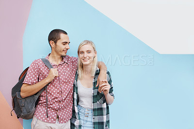Buy stock photo Portrait, couple and love with hug, wall and embrace with mockup space and students. Face, university and man with woman and support with smile and city with modern art and college with education