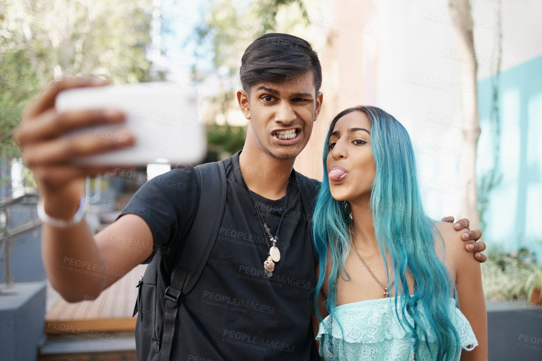 Buy stock photo Selfie, funny or happy couple on social media in college, university or campus to relax together. Students, Indian woman or man in picture, vlog or photo for bonding with hug, support or mobile app