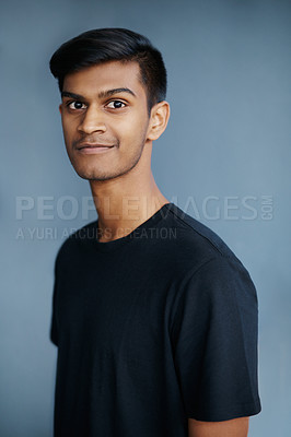 Buy stock photo Studio, portrait and smile of Indian student, guy and confidence with tshirt, fashion and college. University, gen z and male person, happiness and background, pride and face of model and stylish