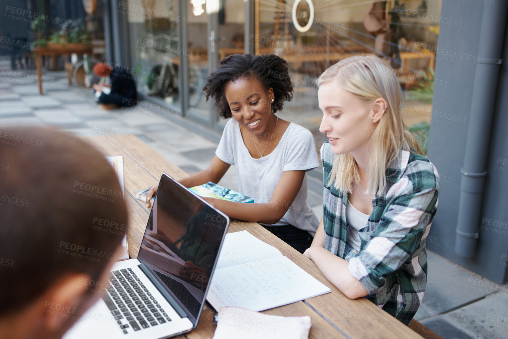 Buy stock photo Students, group and study outdoor at university with books, laptop and learning for education and campus. Friends, gen z people and teamwork research with smile, diversity and college break by table