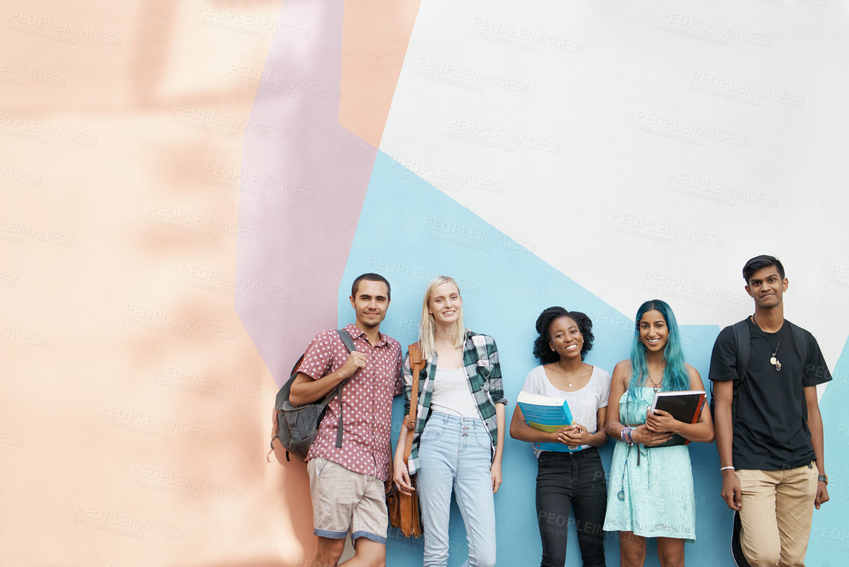 Buy stock photo Portrait, group and university for education by wall with friends for learning. Happy, multiracial students and people  for academic teamwork outdoors to study, support and achieve positive goals 