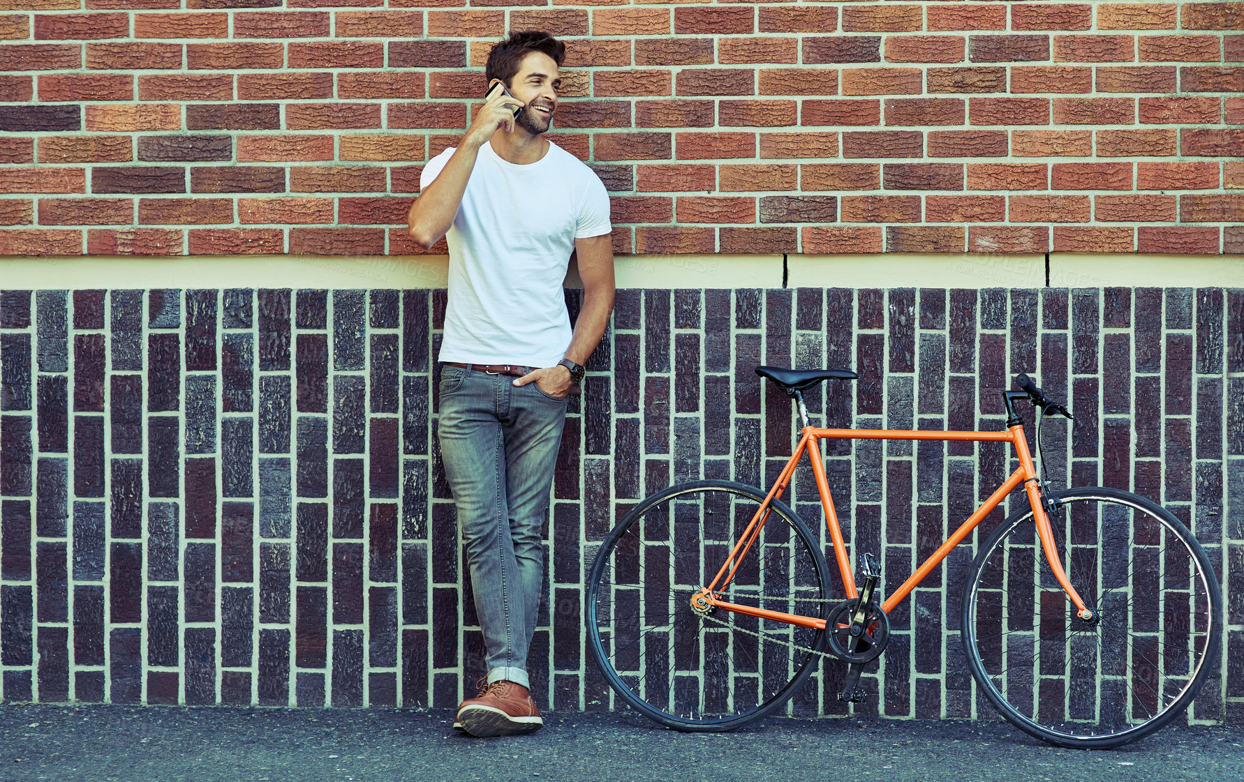 Buy stock photo Happy, bicycle and man in city on phone call for mobile communication, urban and active lifestyle. Person, smartphone and bike for eco friendly transport, conversation and connection for travel plans