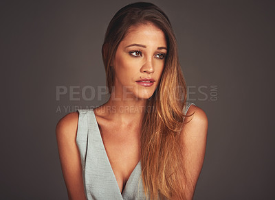 Buy stock photo Young, woman and beauty on dark background for fashion, style and pose in backdrop. Female person, confidence and pride in clothes, cosmetics and makeup for salon or haircare in studio or backdrop
