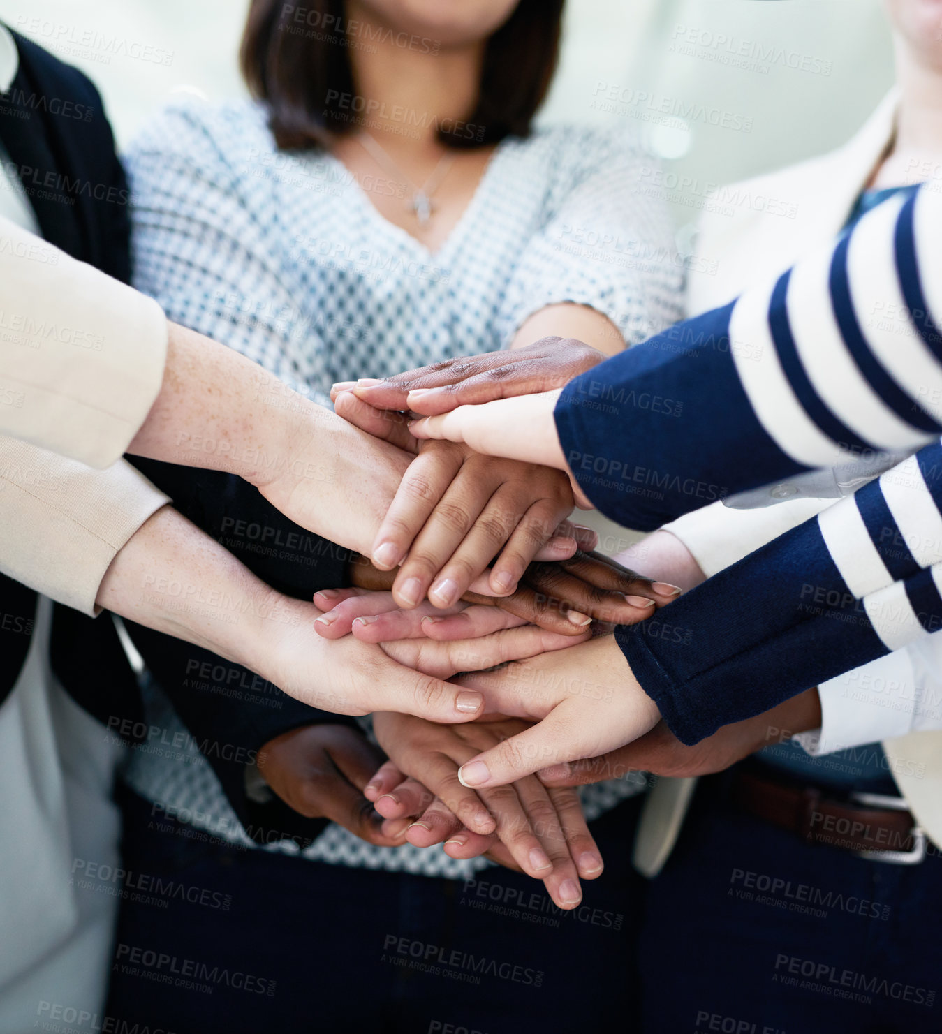 Buy stock photo Office, teamwork and group of people with hands together in huddle in solidarity, creative collaboration or support. Synergy, employee engagement or professional women in growth, development or trust