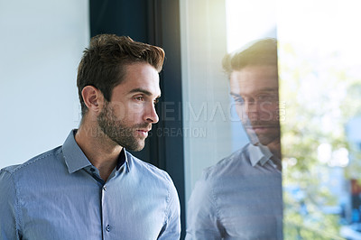 Buy stock photo Window, business and man in office thinking or ideas for startup company or career in corporate. Male employee, serious and reflection to wonder or dream for entrepreneurship, planning and vision.