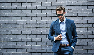 Buy stock photo Stylish, male person and lawyer in suit with mockup space for fashion, style and trendy in outdoor. Man, pride and confidence in street for work, corporate or career in law firm in grey background