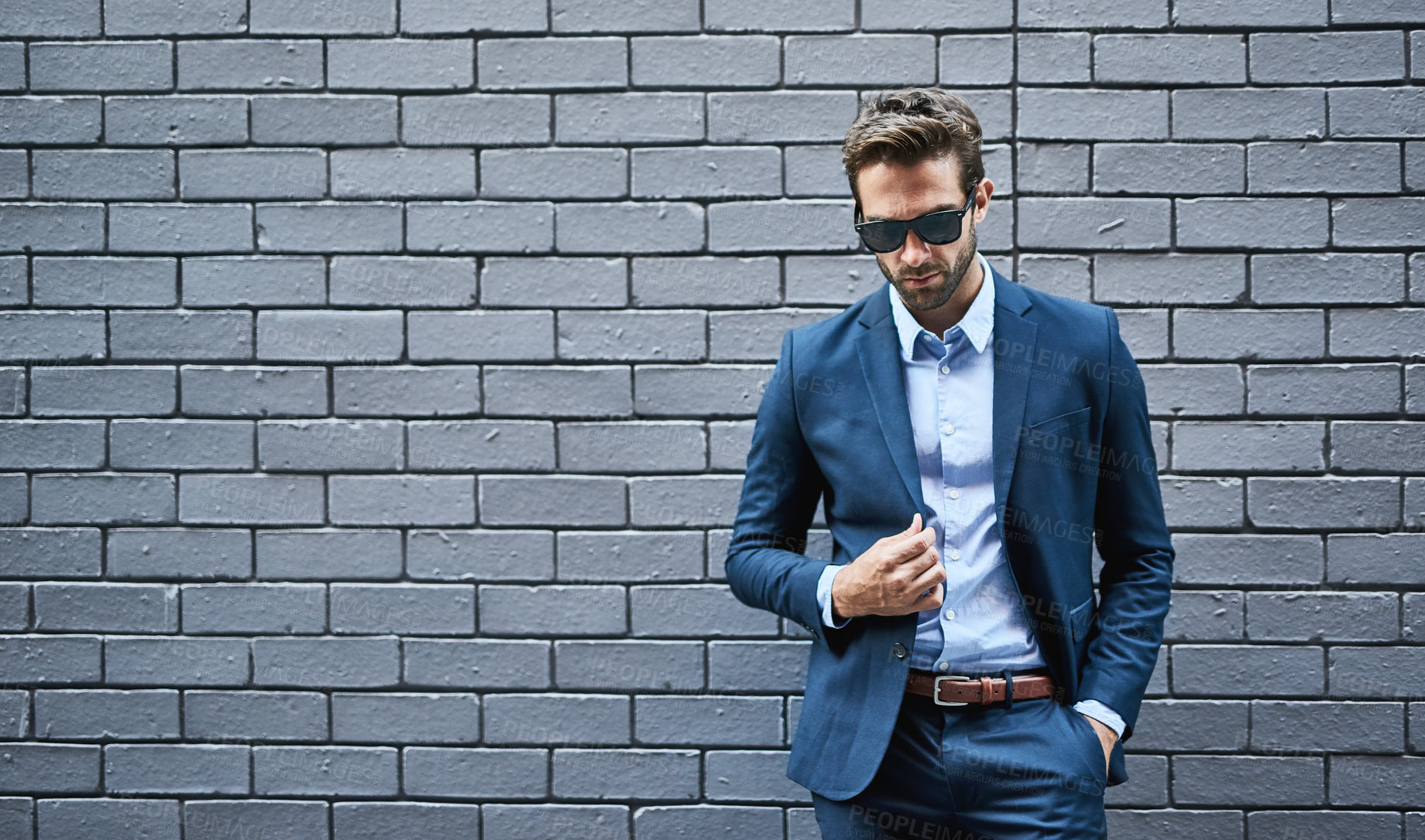 Buy stock photo Stylish, male person and lawyer in suit with mockup space for fashion, style and trendy in outdoor. Man, pride and confidence in street for work, corporate or career in law firm in grey background