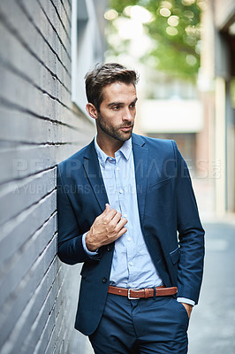 Buy stock photo Businessman, fashion and wall with suit and confidence for career, clothing or trendy and cool. Male lawyer, city background and stylish or formal for job in corporate, legal with hands in Boston