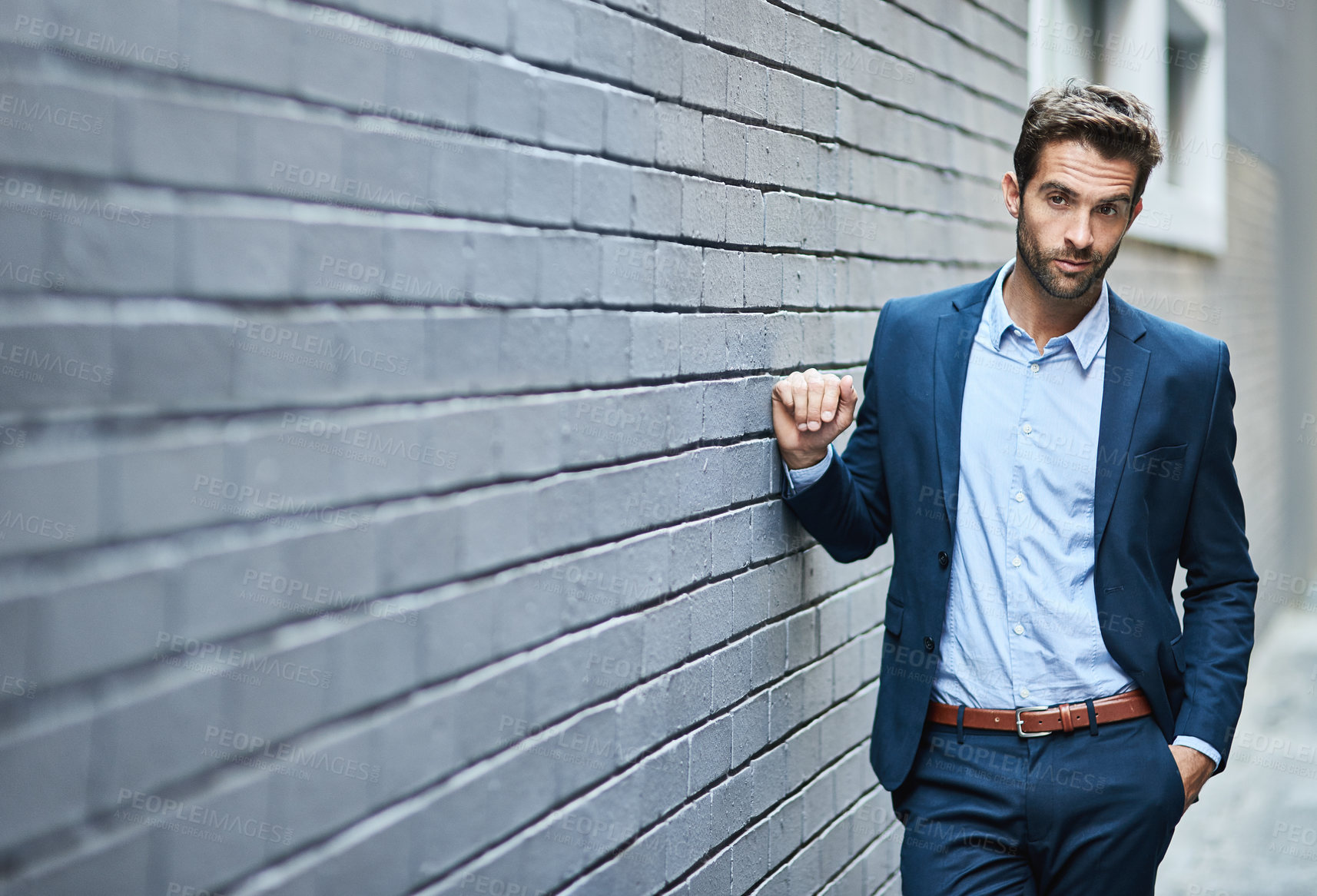 Buy stock photo Business fashion, corporate style and man with luxury professional clothes, blue fabric suit and relax on wall. Designer apparel outfit, success and businessman with confident attitude in formal wear