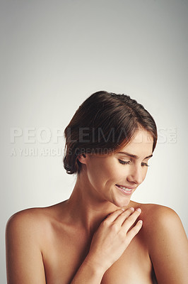 Buy stock photo Woman, topless and smile in studio for skincare, dermatology and cosmetic on white background. Young person or confident lady and happy for natural beauty, smooth and aesthetic for fresh on mockup