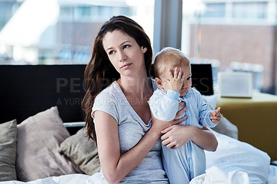 Buy stock photo Shot of a mother and her baby boy at home 