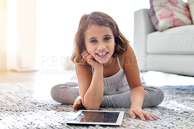 Buy stock photo Girl, tablet and portrait in lounge for gamification, virtual entertainment and online fun for children. Young child or kid and happy with tech for internet, digital learning and development indoor