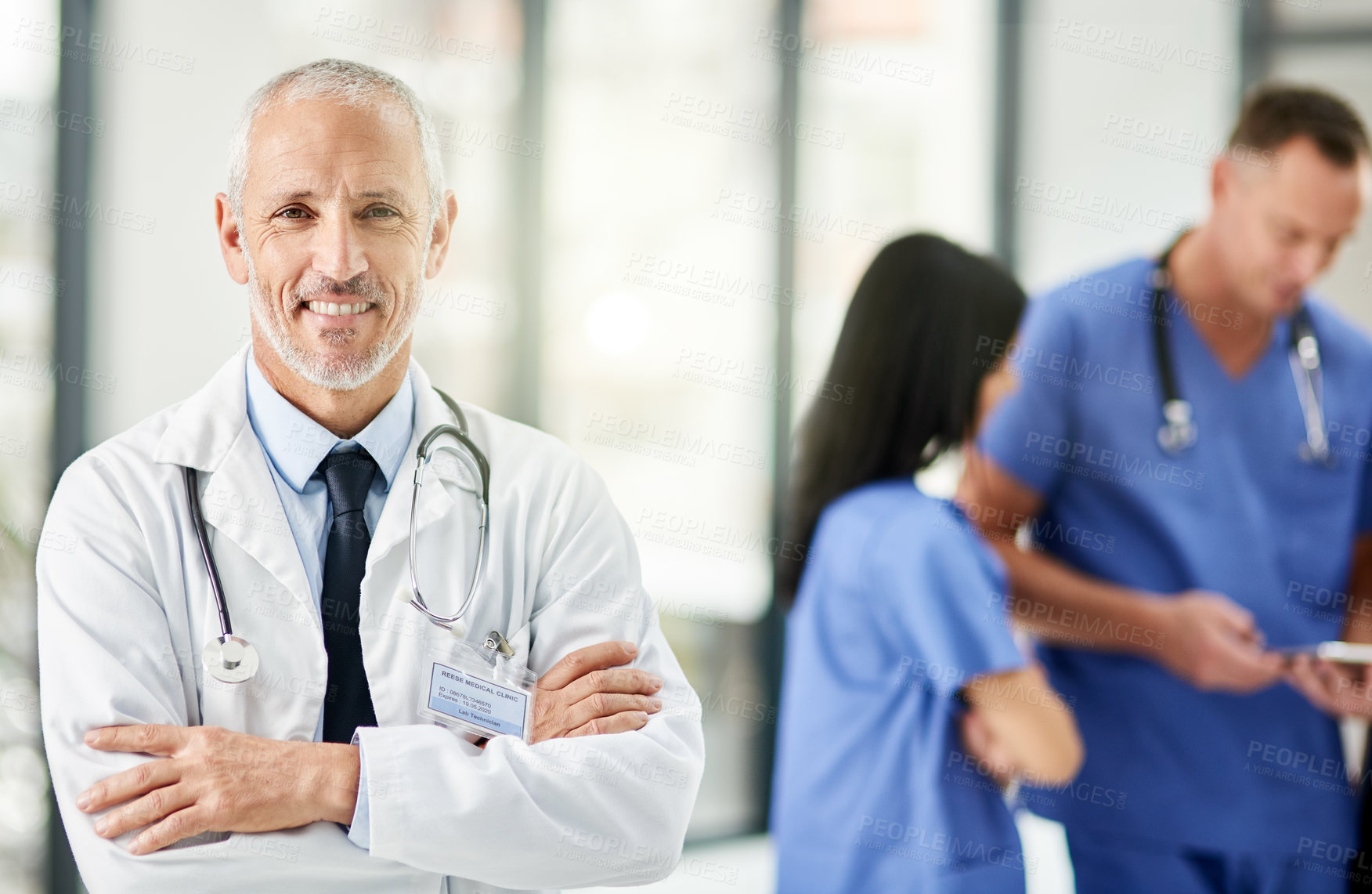 Buy stock photo Healthcare, smile and portrait of senior doctor with arms crossed, pride and support in hospital. Health care, happiness and expert medicine, confident and happy man, medical professional in clinic.