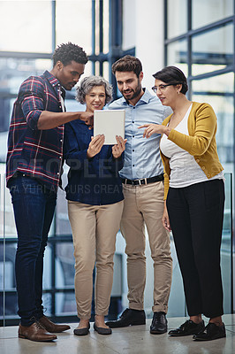 Buy stock photo Tablet, group and business people in lobby for advice, online agenda or schedule for planning. Manager, men and women in office on digital app for consulting, opinion and teamwork at creative agency