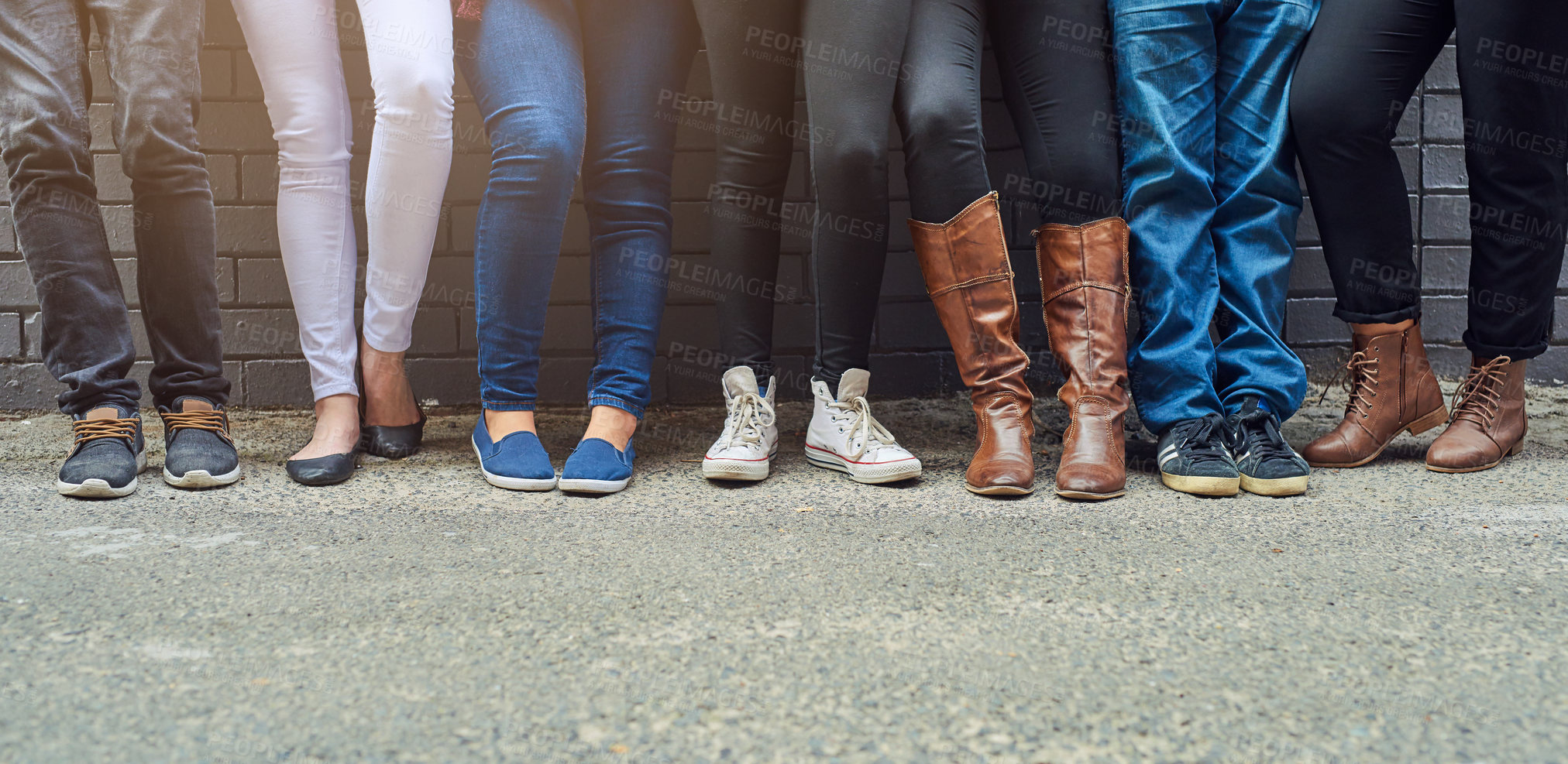 Buy stock photo People, legs and shoes in row with against wall for fashion, style and outfit in streets of New York. Group, friends and together with footwear for trends, casual wear and chill or relax outdoor