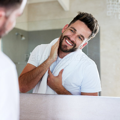 Buy stock photo Grooming, morning and man with cleaning and mirror routine in a bathroom with a smile. Home, reflection and skincare with a young male person feeling happy from beard growth and face dermatology