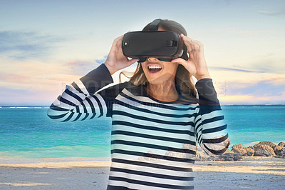 Buy stock photo Shot of a young woman wearing a VR headset superimposed over a beach landscape