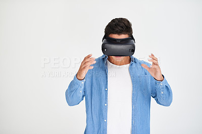 Buy stock photo Man, vr and and futuristic technology on mockup standing amazed against a white studio background. Male in virtual reality, metaverse or future innovation with digital headset on mock up space