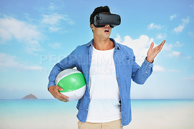 Buy stock photo Shot of a young man wearing a VR headset superimposed over a beach landscape