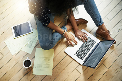 Buy stock photo High angle shot of a young female designer working in her office