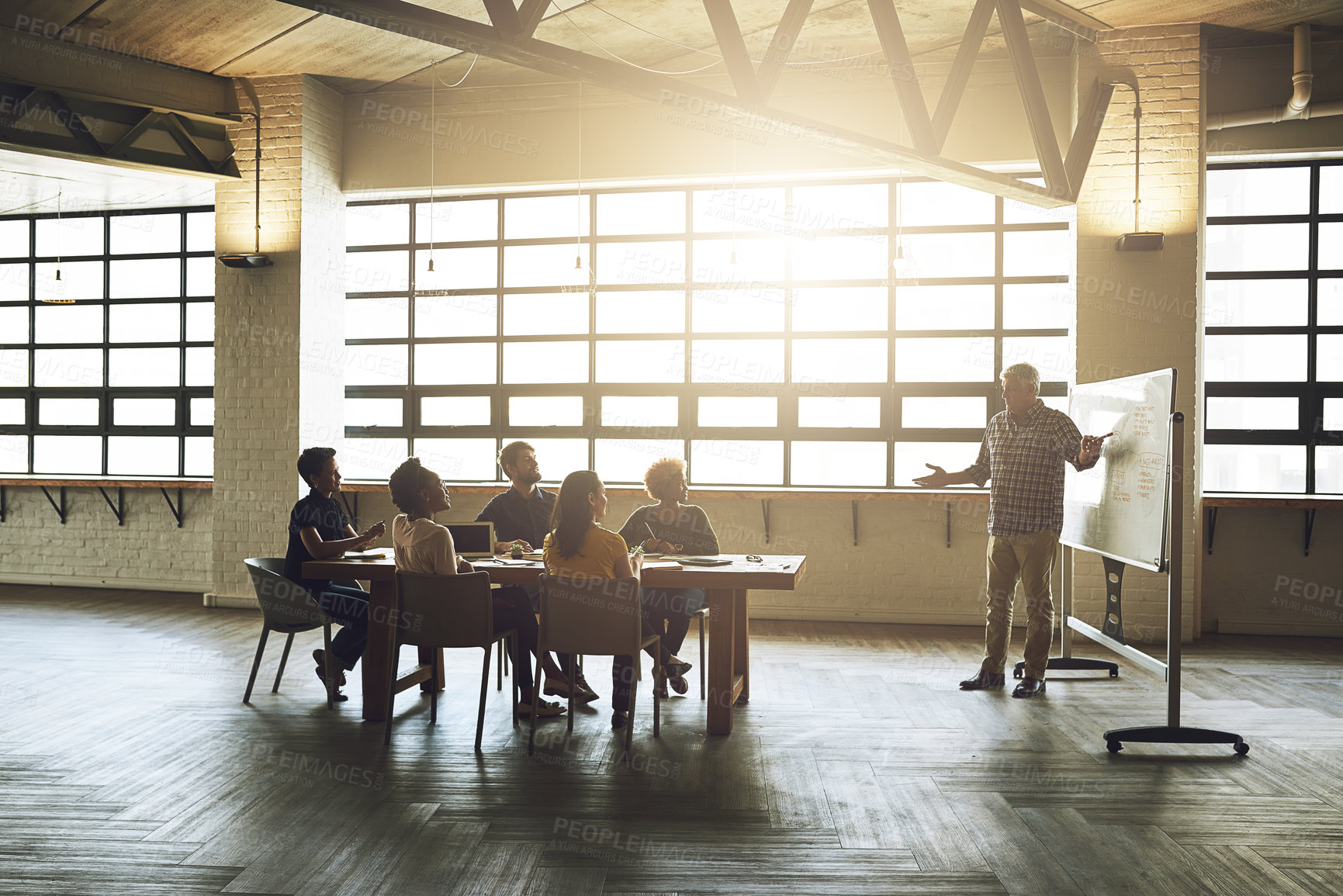 Buy stock photo Whiteboard, presentation and business people in discussion at office for proposal, planning and development. Employee, kpi and meeting with idea in workshop for company review, growth and training