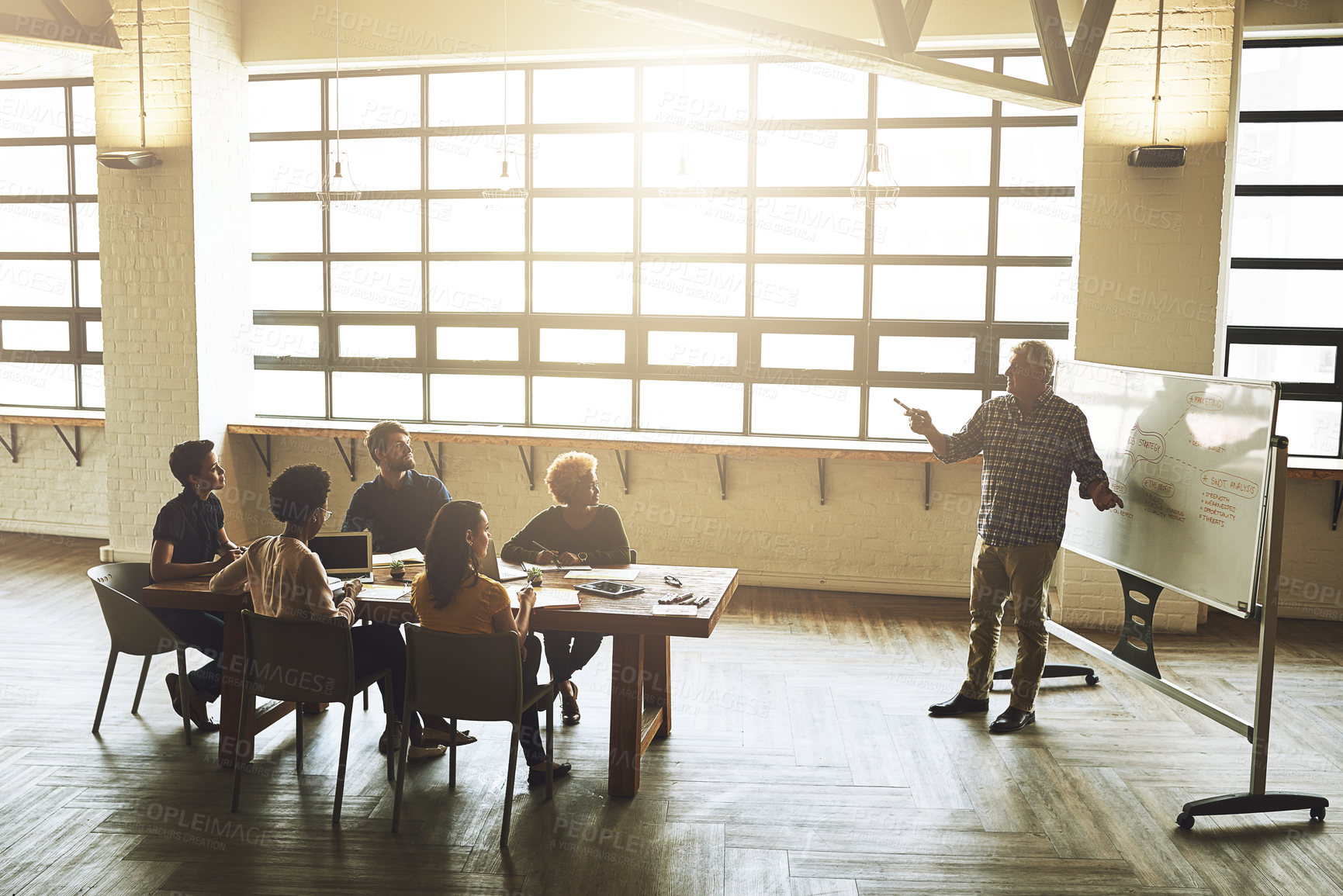 Buy stock photo Whiteboard, meeting and business people in discussion at office for development, planning and leadership. Employee, kpi and presentation with idea in workshop for company growth, review and training