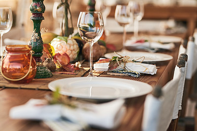 Buy stock photo Lunch, thanksgiving or Christmas table, glass and decoration for festive holiday celebration, plates and cutlery in home. Dinner, wine glass and pining table for party event in family home or house