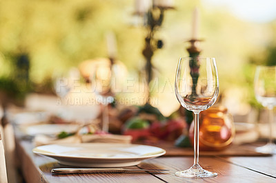 Buy stock photo Restaurant, wine glass and table for dinner, party or thanksgiving celebration with luxury, winery and hospitality industry, Patio, plate and outdoor eating experience for lunch or drink background