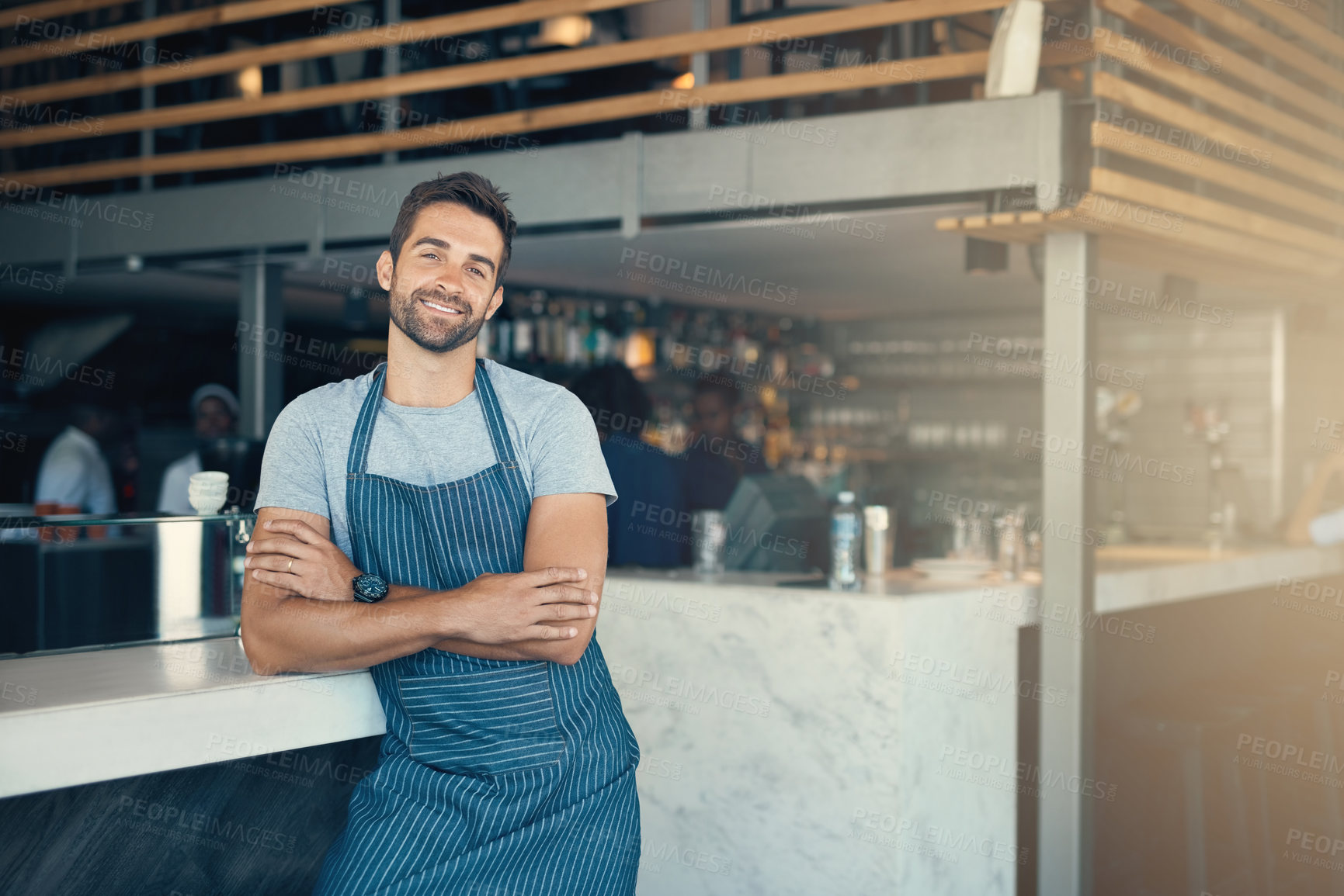 Buy stock photo Portrait of a young man working in a cafe