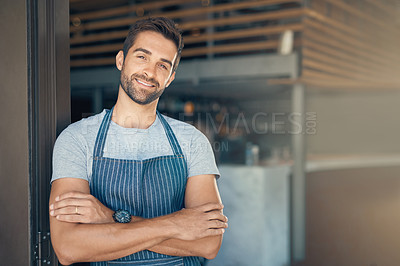 Buy stock photo Portrait of a young man working in a cafe
