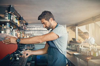 Buy stock photo Man in cafe, coffee machine and barista, prepare caffeine drink order with process and production in hospitality industry. Service, male waiter working on espresso or latter beverage in restaurant 