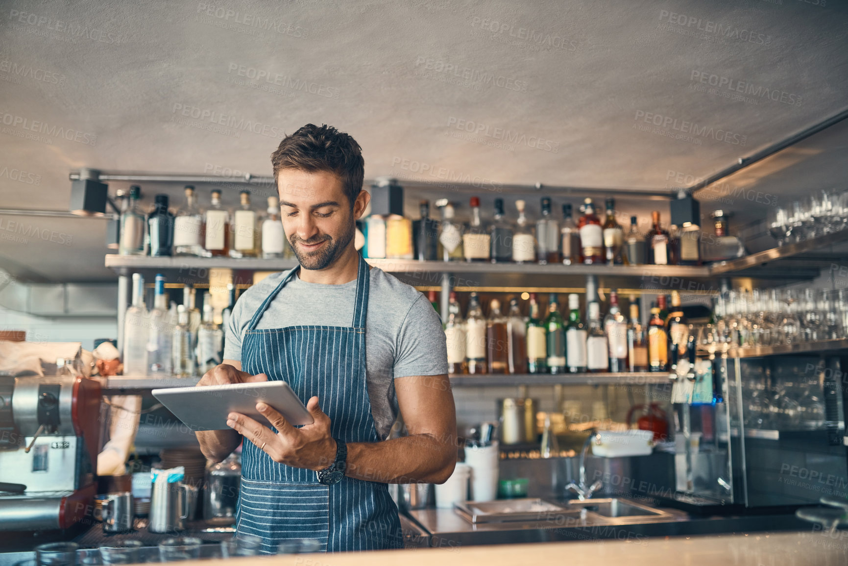 Buy stock photo Man in restaurant, tablet and small business with inventory check, entrepreneur in hospitality industry and connectivity. Male owner, scroll and cafe franchise with digital admin and stock taking