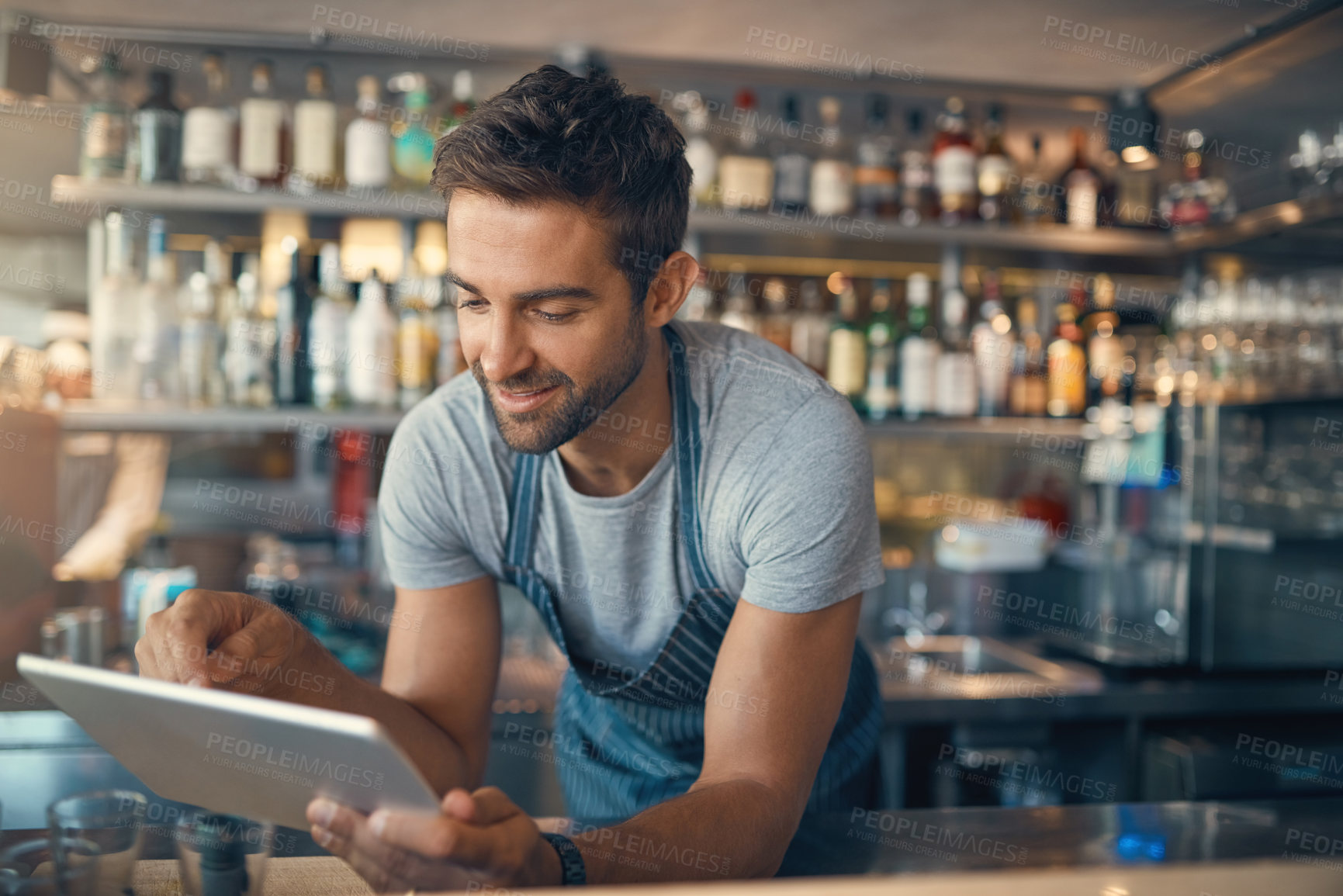 Buy stock photo Cafe, waiter and reading on digital tablet, scroll through inventory list and check stock, small business and hospitality. Man, owner and franchise with admin and stocktaking with connectivity