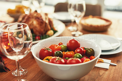 Buy stock photo Food, traditional and celebration with tomato on table for thanksgiving, meal and luxury, turkey and nobody. Chicken, nutrition and family lunch setup for christmas, sunday or family reunion party