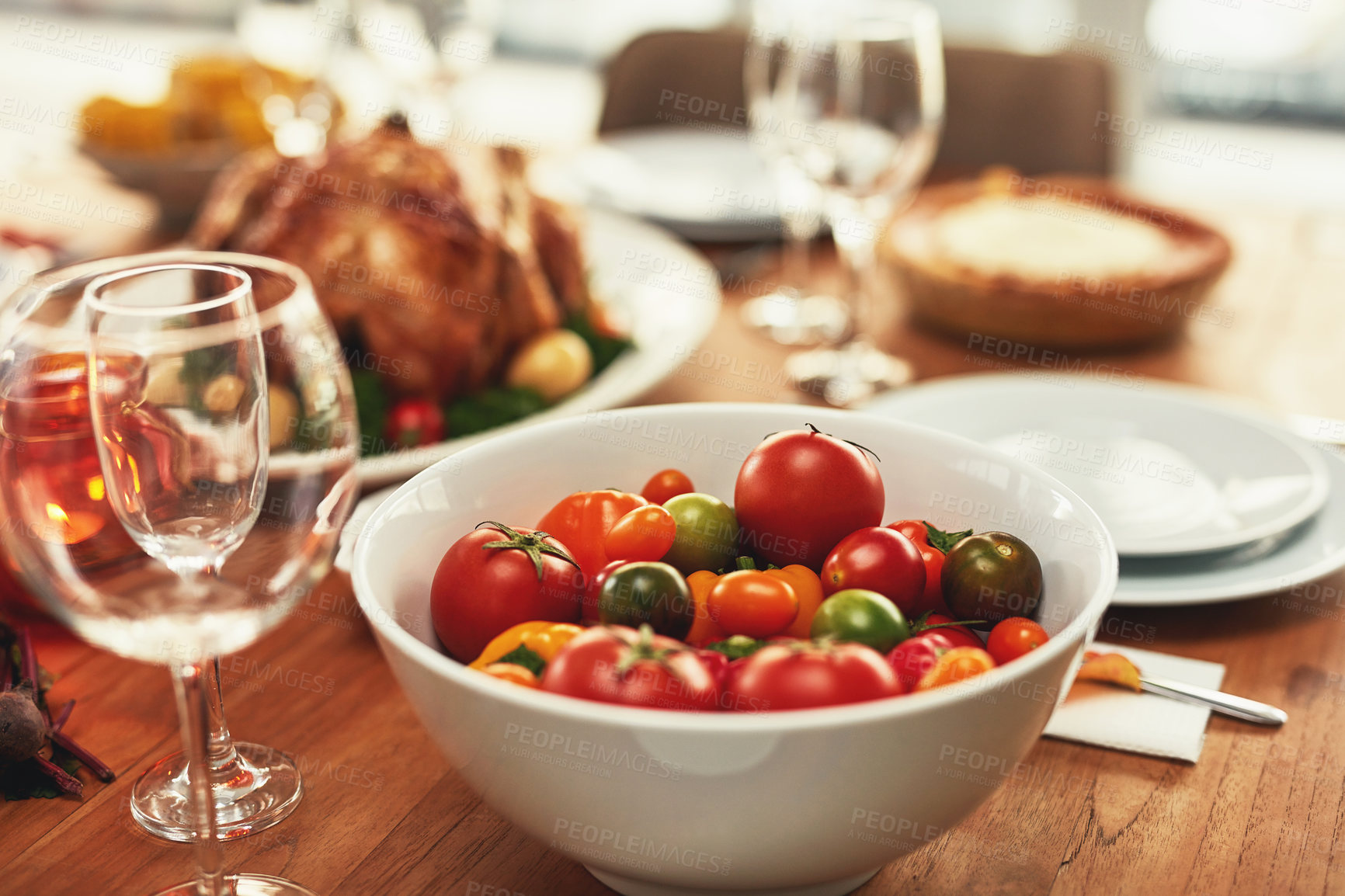 Buy stock photo Food, traditional and celebration with tomato on table for thanksgiving, meal and luxury, turkey and nobody. Chicken, nutrition and family lunch setup for christmas, sunday or family reunion party