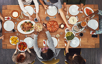 Buy stock photo Top view, holiday dinner and thanksgiving table in social home, house or restaurant with festive food. Above, dining room or friends group with diversity, celebration or lunch with happiness together