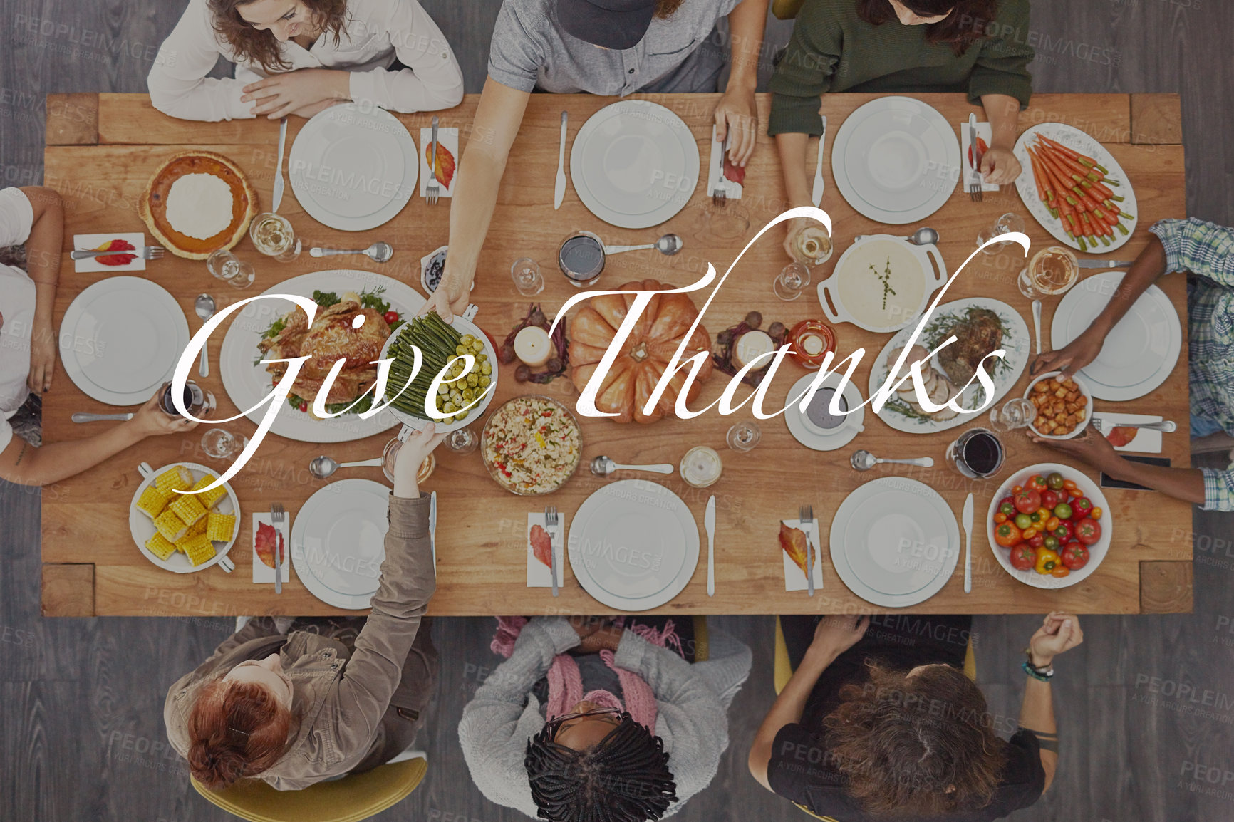 Buy stock photo Thanksgiving, food and above of friends with overlay for dinner party, celebration or festive event. Family, words and people at feast, lunch or gourmet meal for holiday, eating together or Christmas