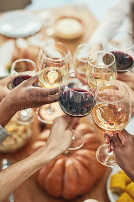 Buy stock photo Wine, cheers and glasses at christmas toast, holiday celebration with food, friends and family together. Hands, wine glasses and friendship, celebrate diversity at dinner party with men and women.