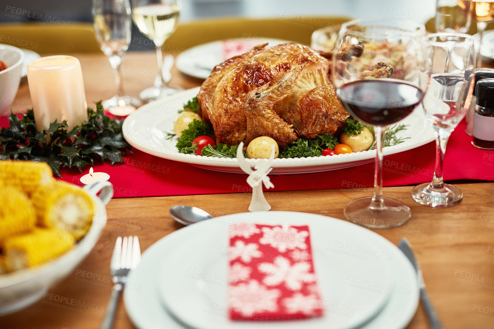 Buy stock photo Christmas, food and alcohol in home for dinner, celebration and family party or social event. Closeup of feast, lunch and gourmet meal on table for holiday, festive eating and Thanksgiving with wine