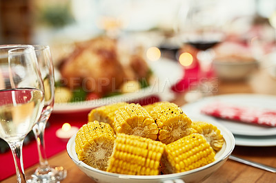 Buy stock photo Corn, healthy and lunch on a table for a celebration, Christmas and nutrition in a house. Food, holiday and dinner in the dining room to celebrate Thanksgiving with a feast and vegetables at home