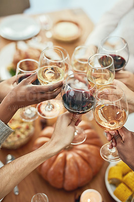Buy stock photo Closeup, hands and wine for celebration, group and dining table for lunch together. Top view, toast and glasses for alcohol, food and people success for holiday, champagne and cheers for happiness.