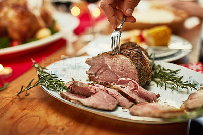 Buy stock photo Hand, fork and beef on a thanksgiving table for tradition or celebration in the holidays closeup from above. Food, meat and Christmas with a place setting on a wooden surface for healthy eating