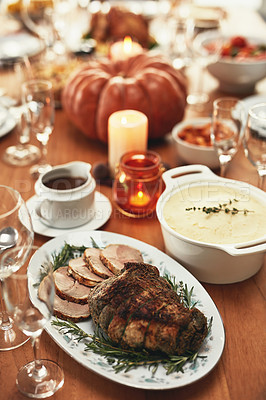 Buy stock photo Thanksgiving, food and meat on dining table in house, empty home or restaurant for holiday celebration, dinner party or healthy lunch. Zoom, texture and festive meal with roast beef slices or turkey