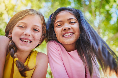 Buy stock photo Shot of two adorable young girls outside